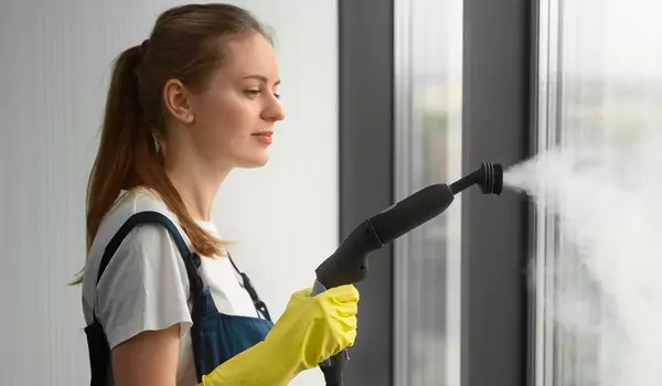 deep cleaning window using steam cleaner