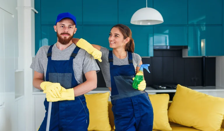 Smiling man and young woman as a professional cleaners