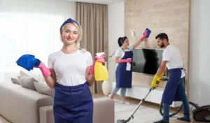 Young woman standing by sofa at home