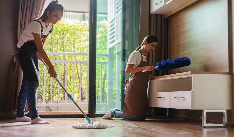 Women cleaning a room