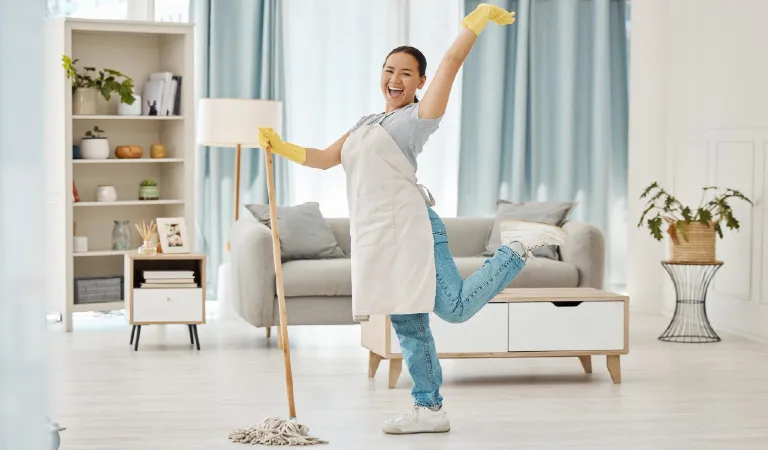 Fun asian woman mop or cleaning living room with housekeeping floor product for home cleaning