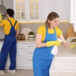 Professional janitors working in kitchen cleaning service